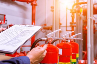 Engineer checking Industrial fire control system,Fire Alarm controller, Fire notifier, Anti fire.System ready In the event of a fire.